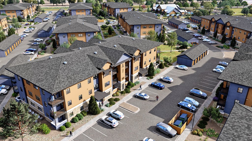 an aerial view of a neighborhood with houses and cars parked