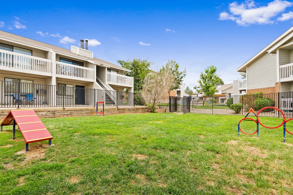 the preserve at ballantyne commons yard with playground and apartment buildings