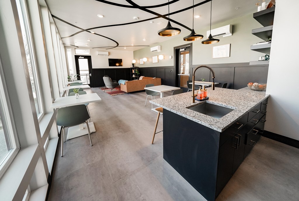 a kitchen and dining area in a modern apartment