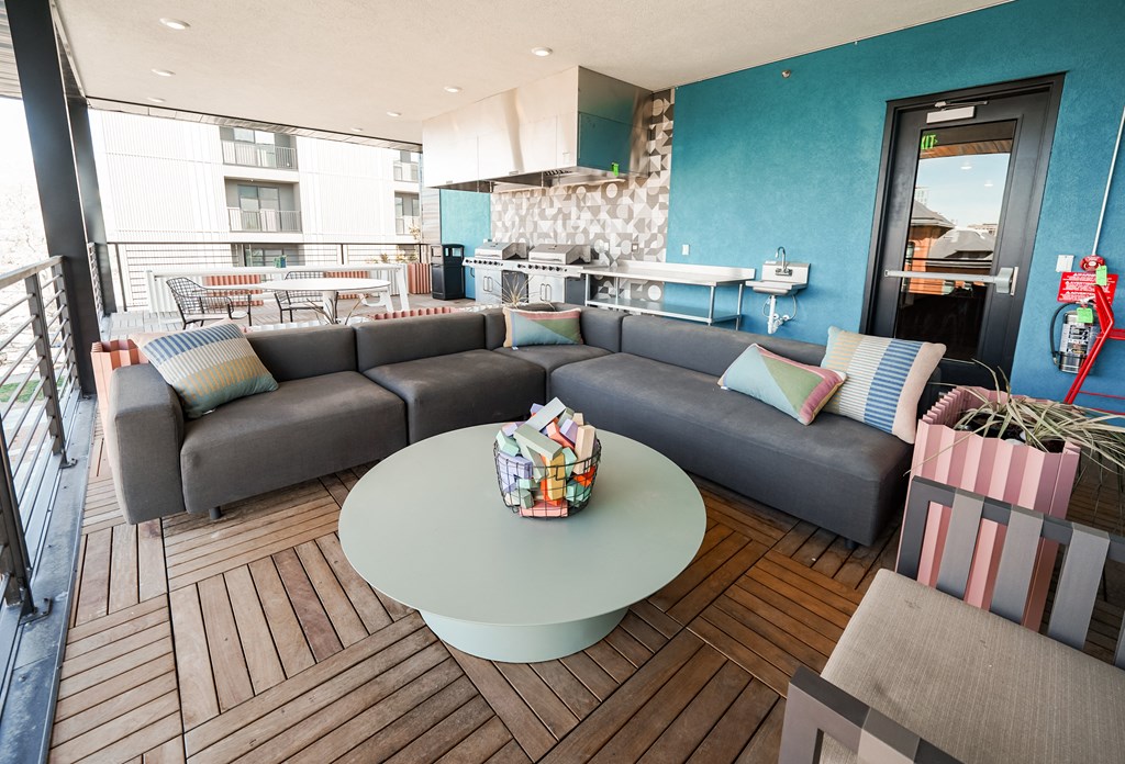 a living room with couches and a table