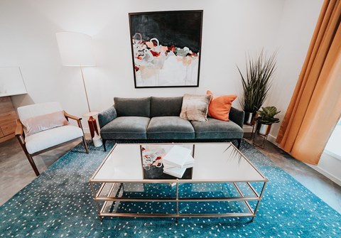 a living room with a couch and a coffee table