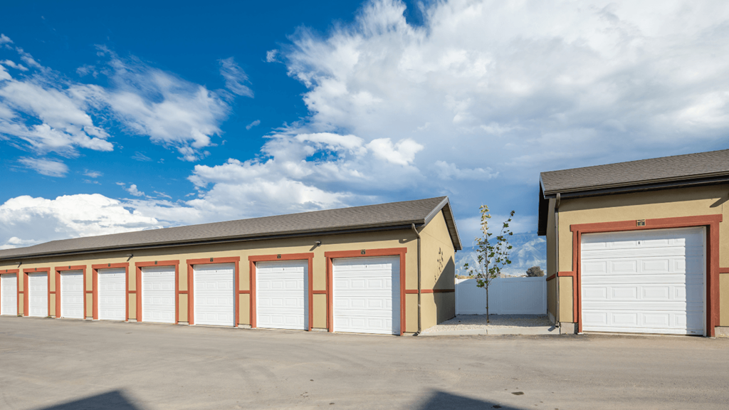 A row of garage doors are closed.