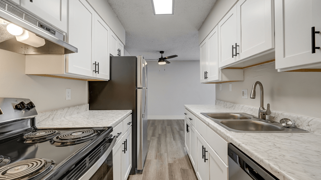 the preserve at ballantyne commons apartment kitchen with stainless steel appliances