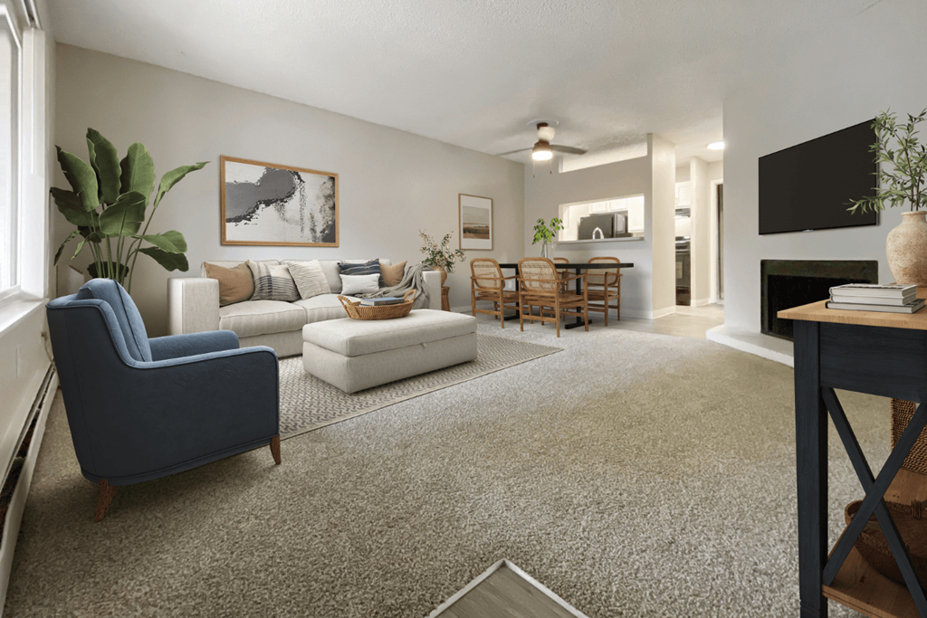 the living room of a home with a couch and a chair