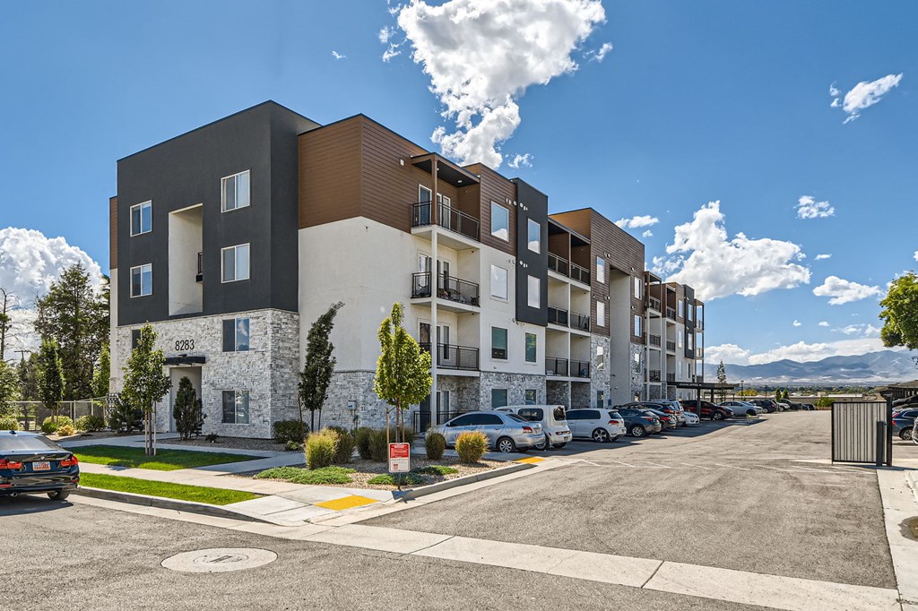 a rendering of an apartment building on a city street