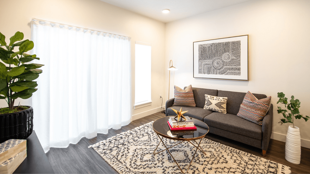 a living room with a couch and a coffee table