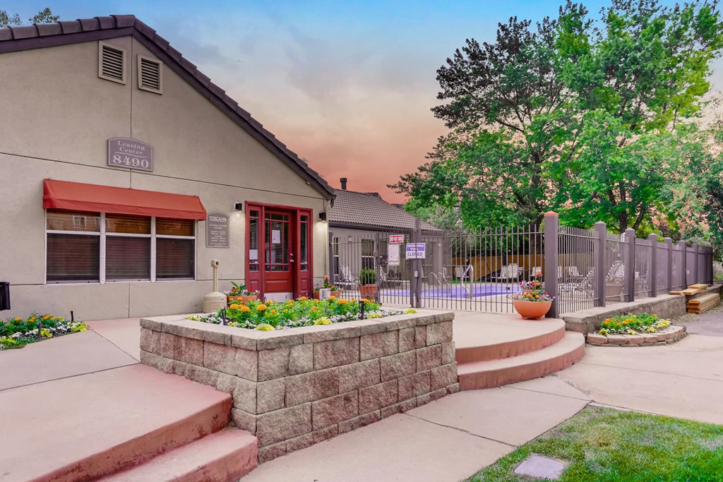 A house with a red awning and a sign that says $4,400 is shown.