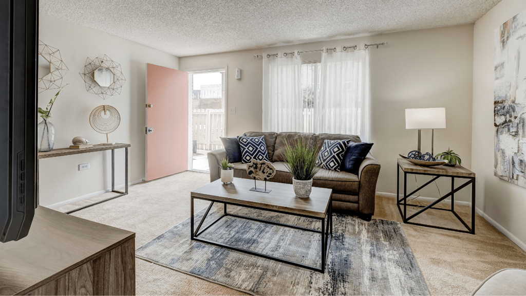 a living room with a couch and a coffee table