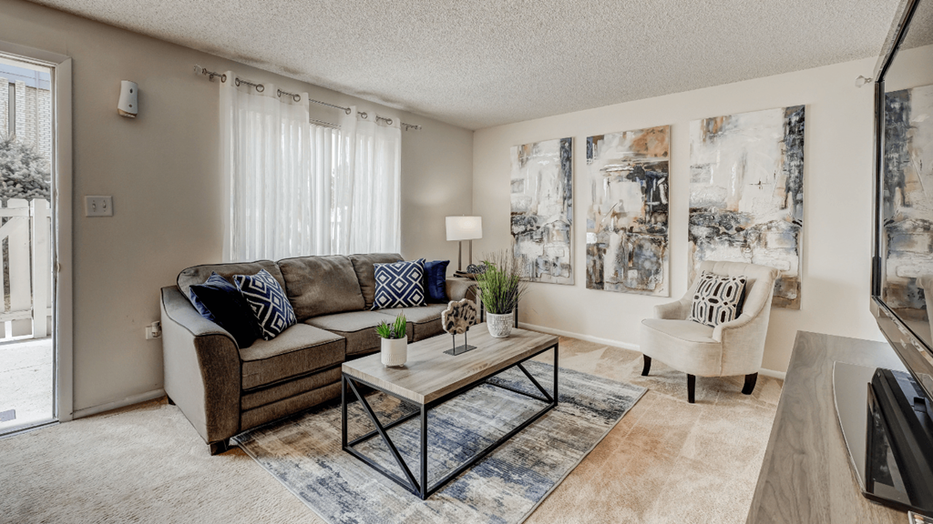 a living room with a couch and a coffee table