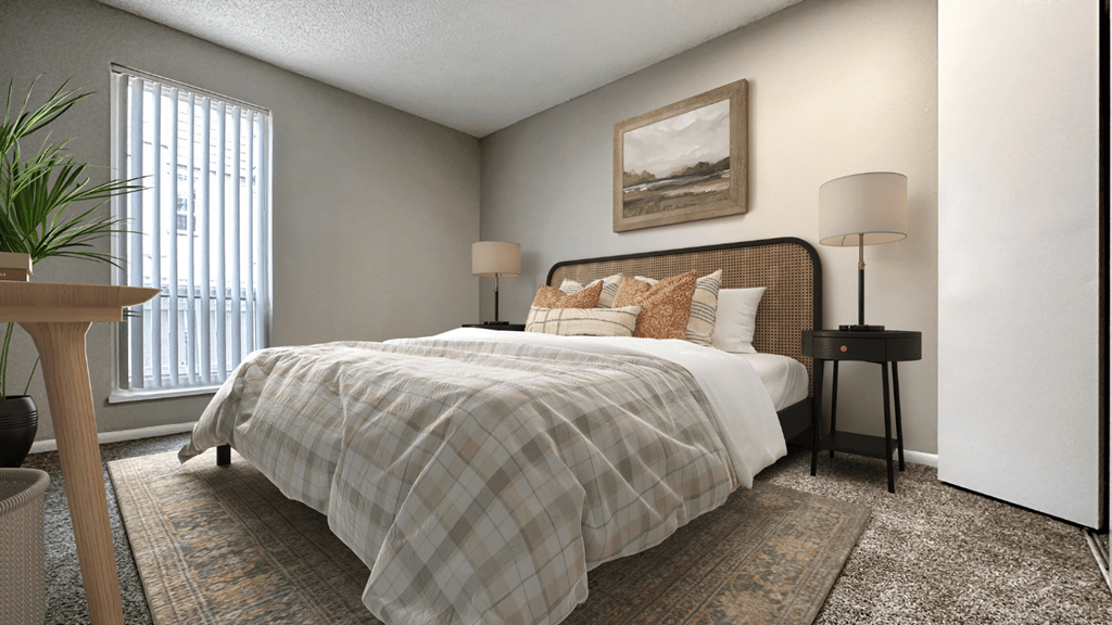 a bedroom with a bed and a window