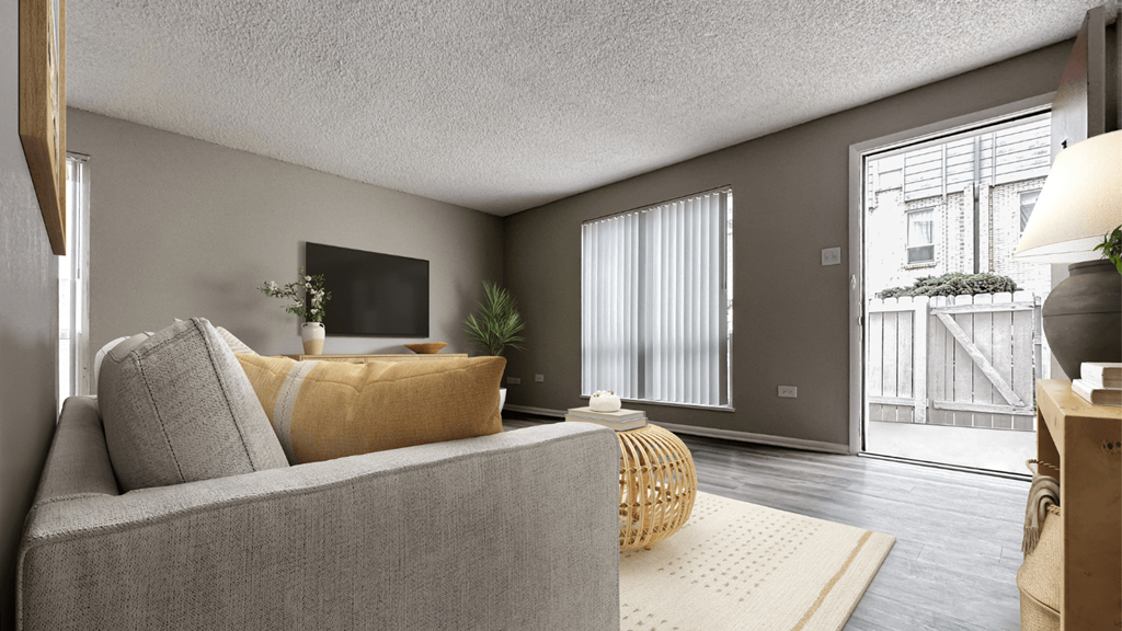 a living room with a couch and a tv