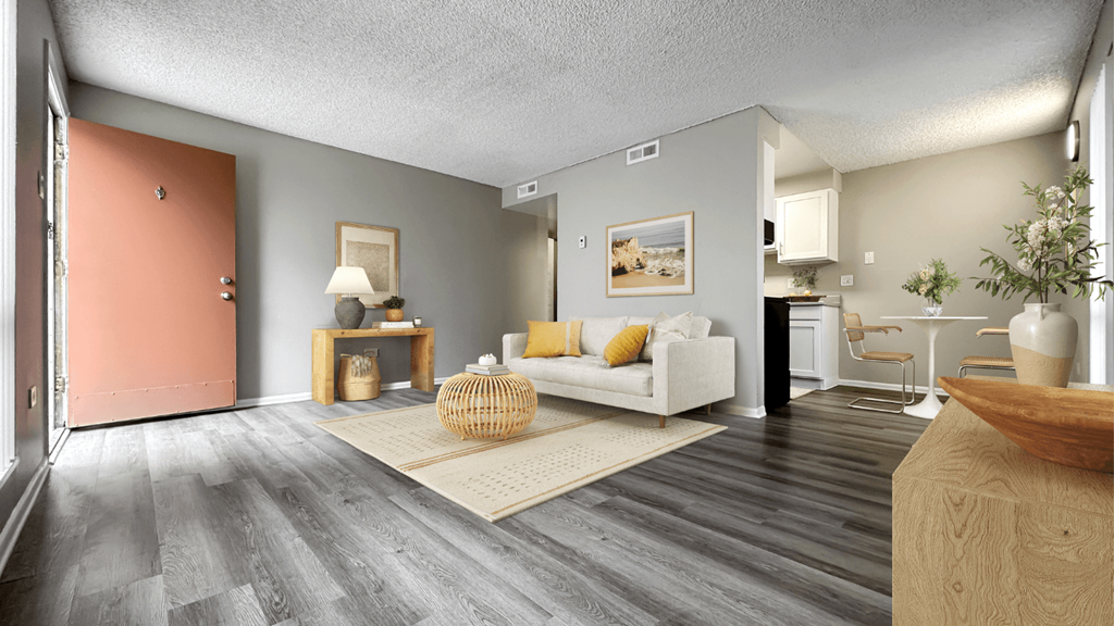 a living room with a couch and a table