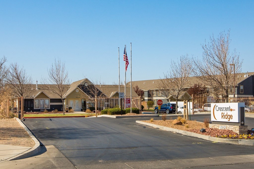 Cresscent Ridge is a residential complex with a flag flying in front.