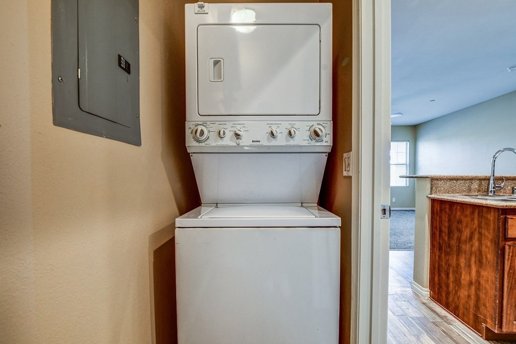 A white dishwasher is installed in a kitchen.