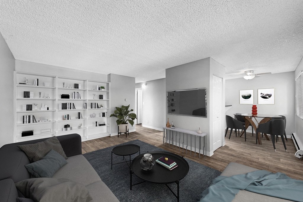 a living room and dining room in an apartment