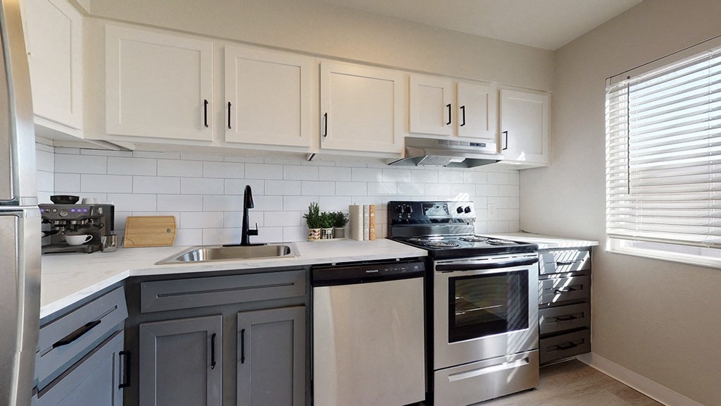 kitchen with white cabinets and stainless steel appliances