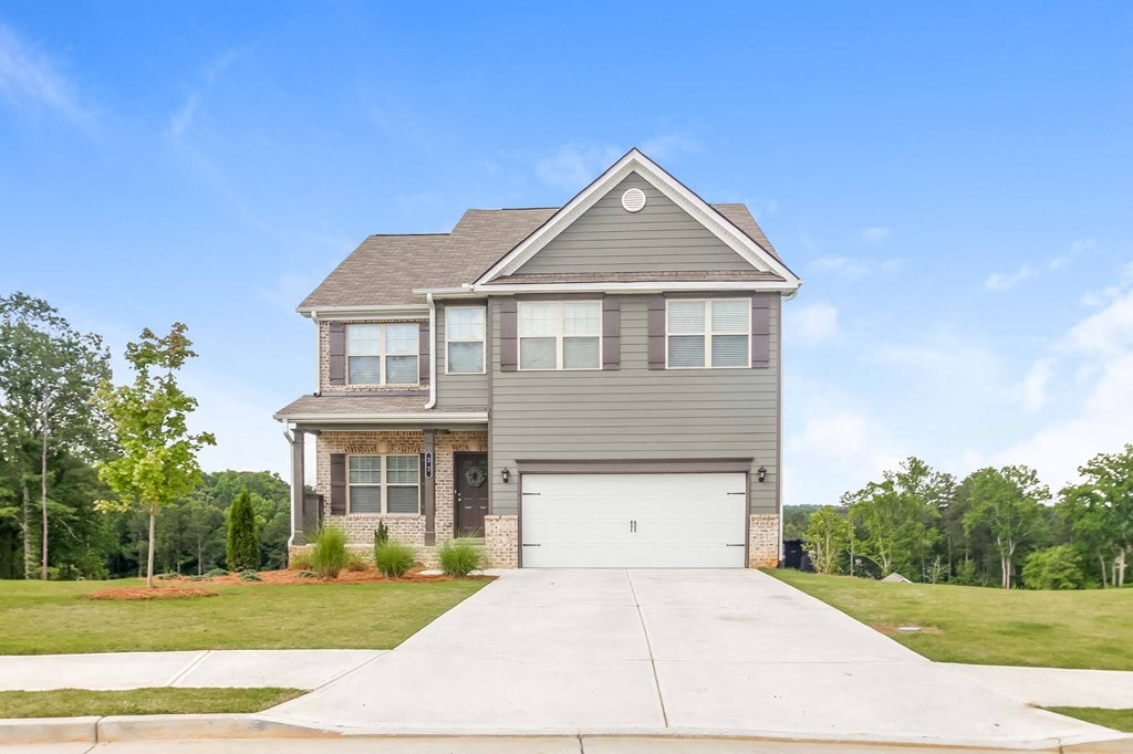 a house with a white garage door