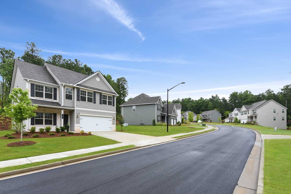 a street with houses on the side of a road