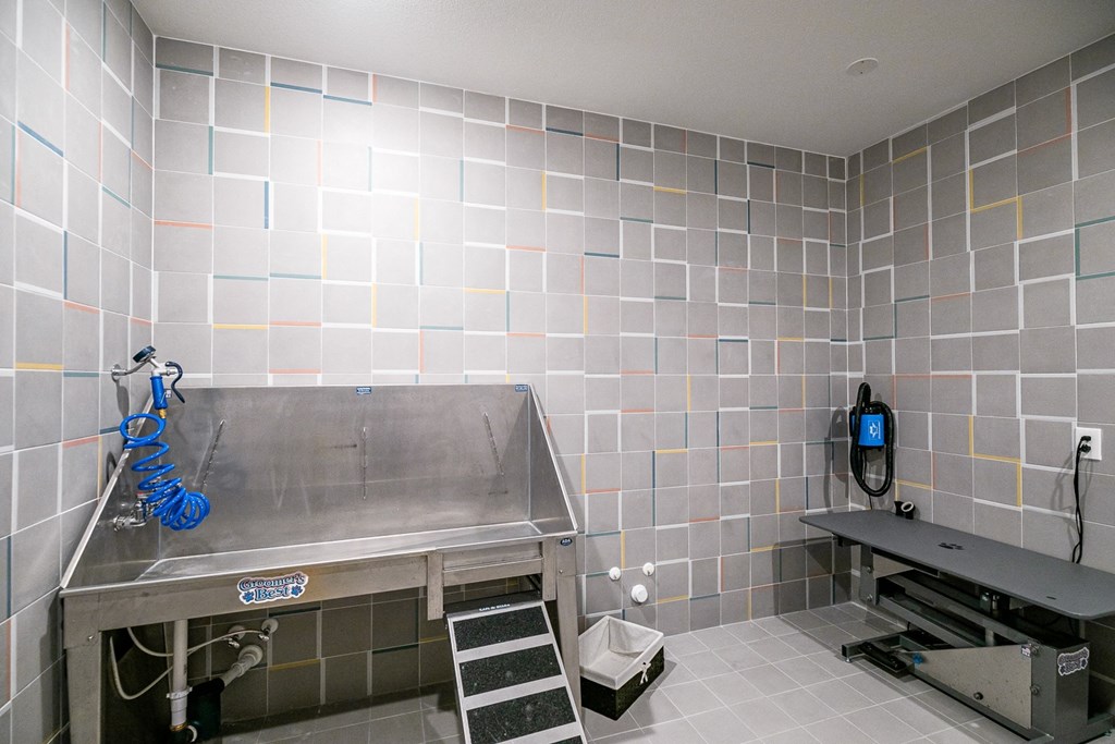 a kitchen with a stainless steel counter and a sink