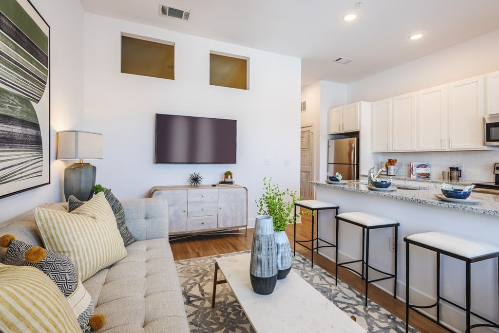 a living room with a couch and a tv