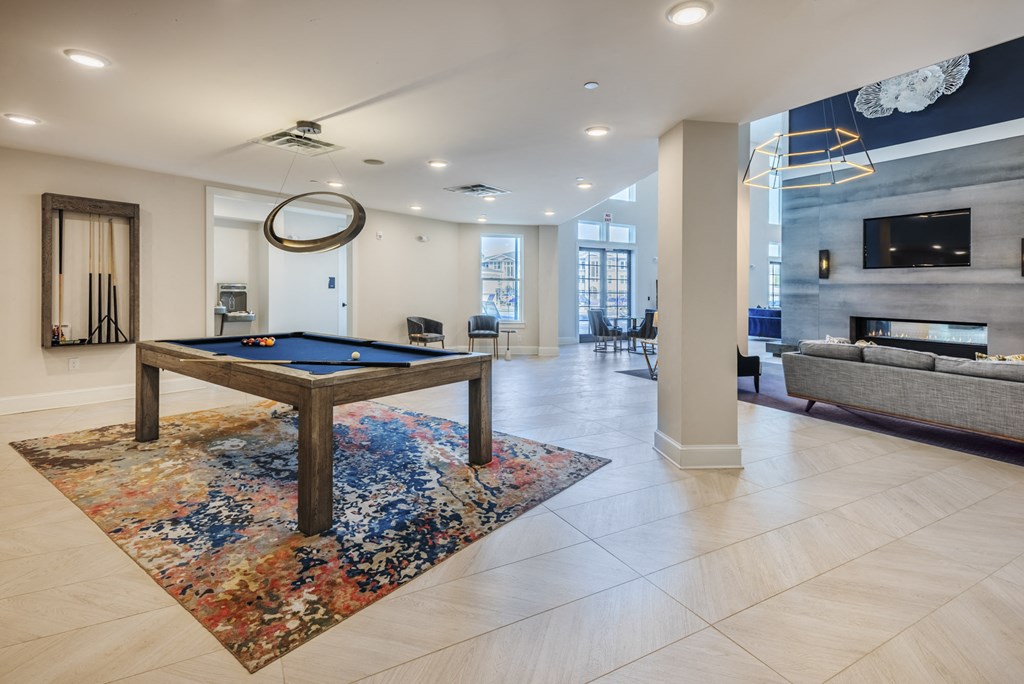 play a game of pool in our clubhouse at our apartments