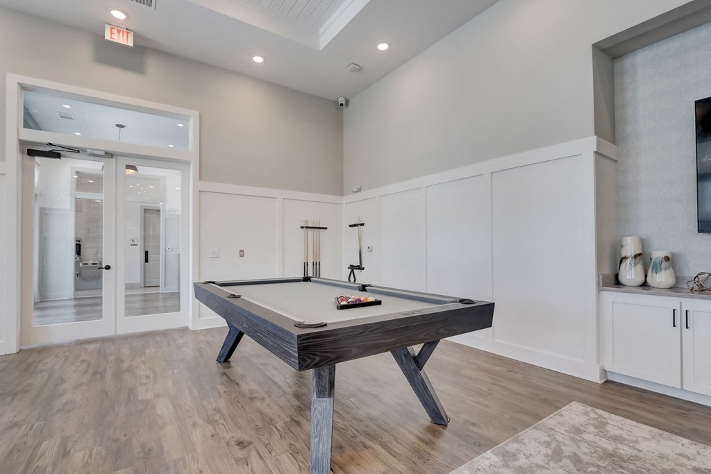 a billiards room with a pool table in a new home