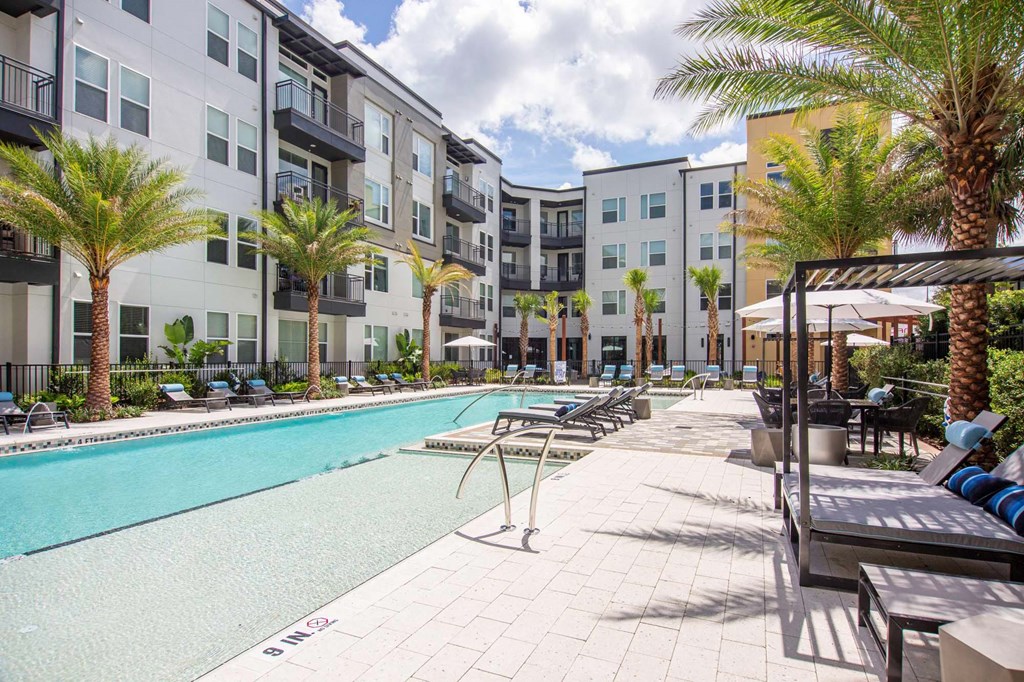 our apartments have a large pool and lounge chairs