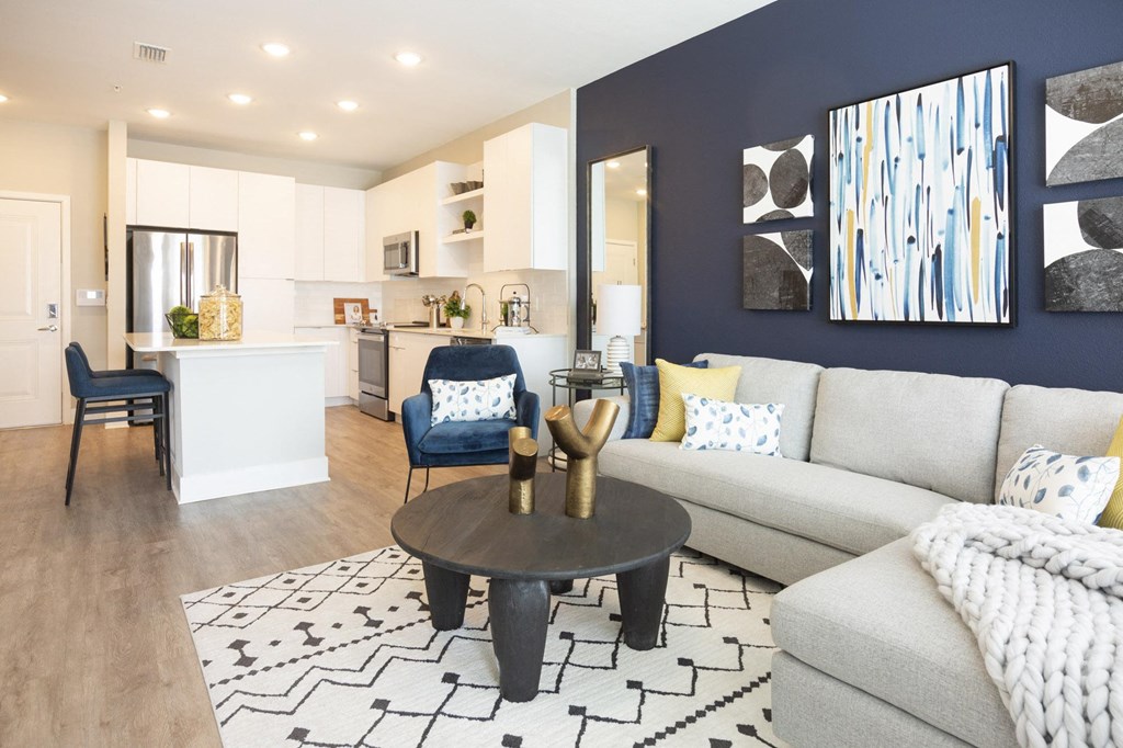 a living room with a couch and a table