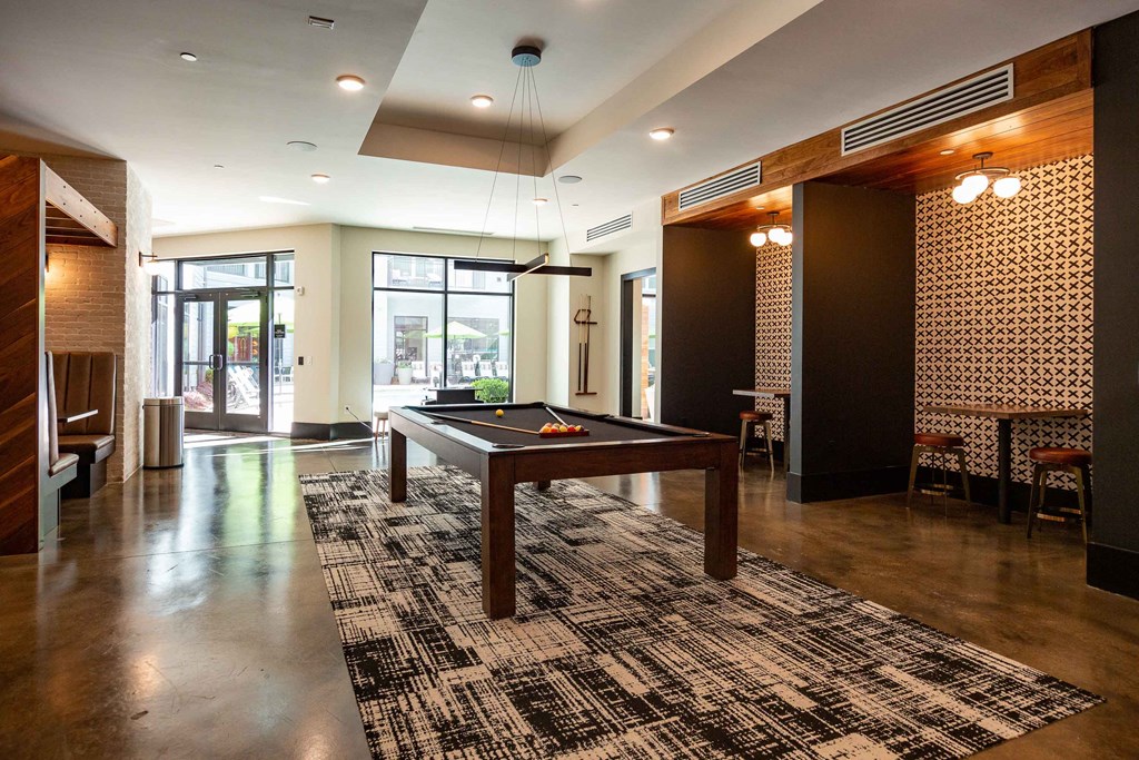 a billiards table in the lobby of a building