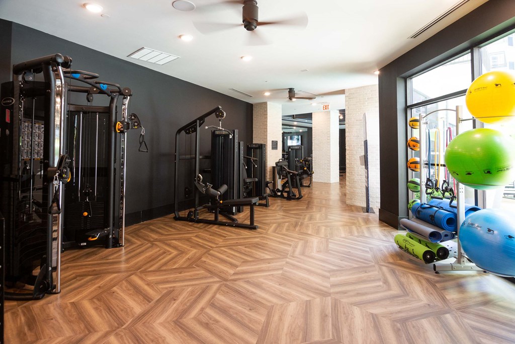 the gym at the flats at big tex apartments