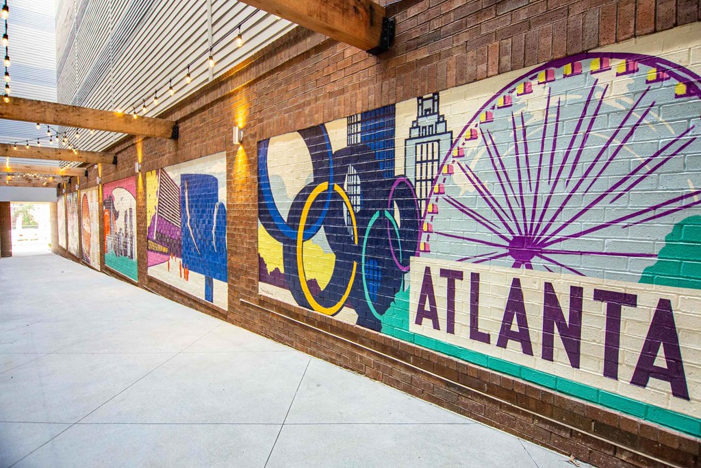 a mural on the wall of a building with the word