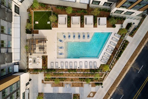 a birds eye view of a swimming pool in the middle of a building