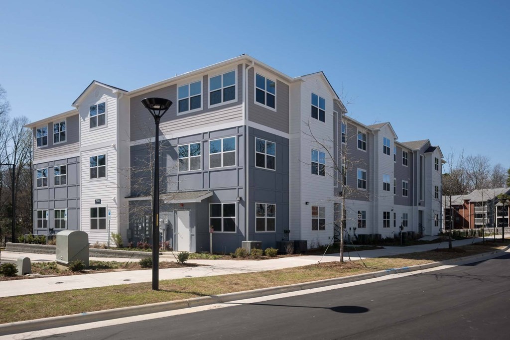 a building with a street light in front of it