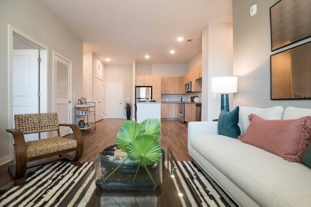 a living room with a couch and a table