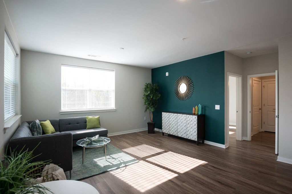 a living room with a couch and a table