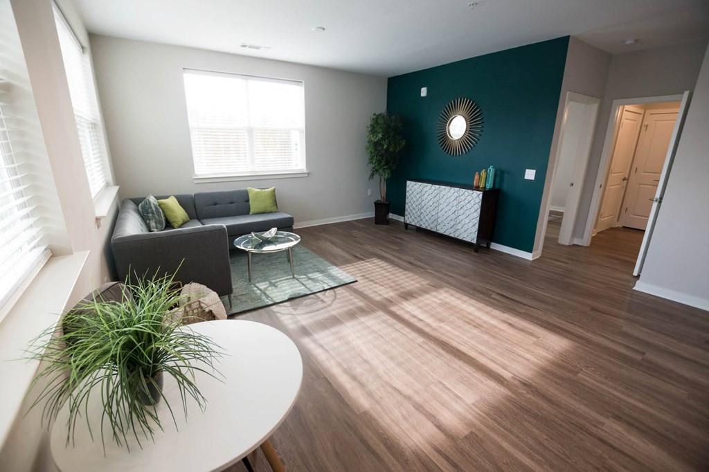 a living room with a couch and a table