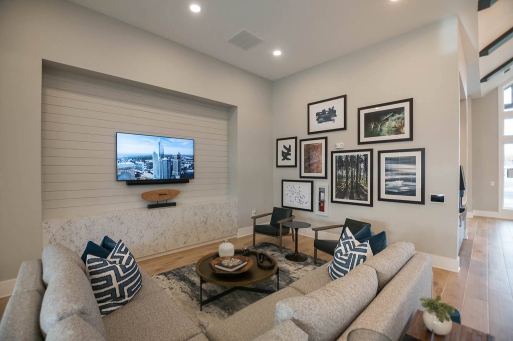 a living room with a couch and a television