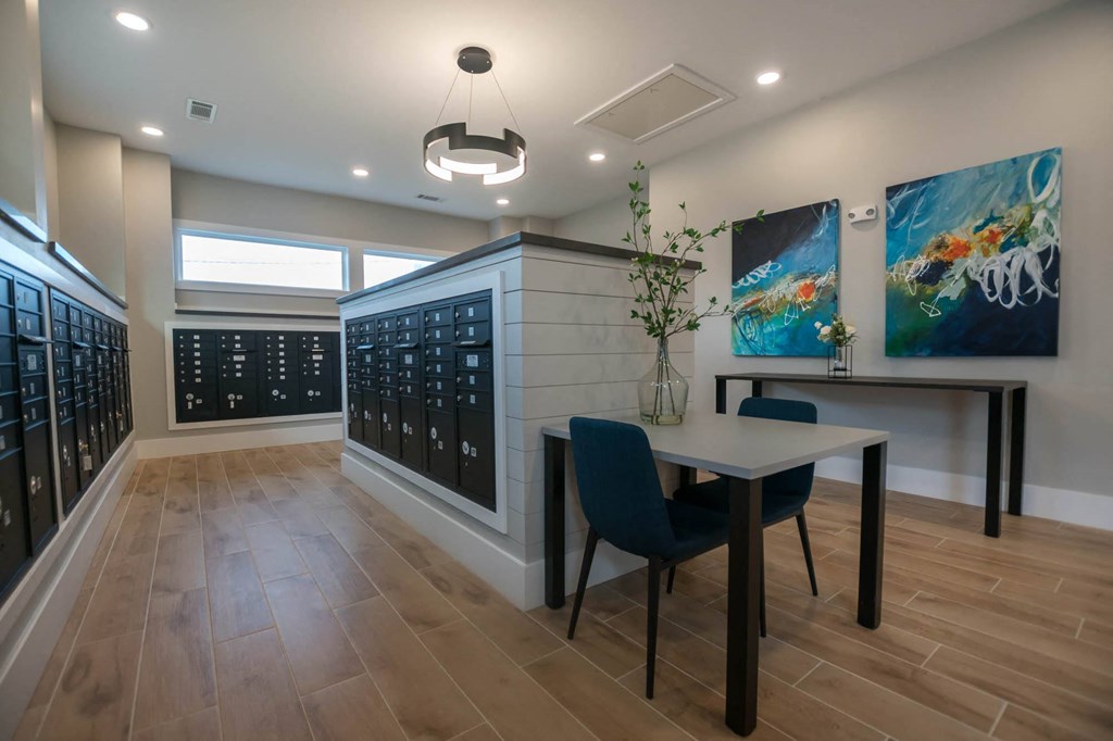 a wine tasting room with a table and chairs
