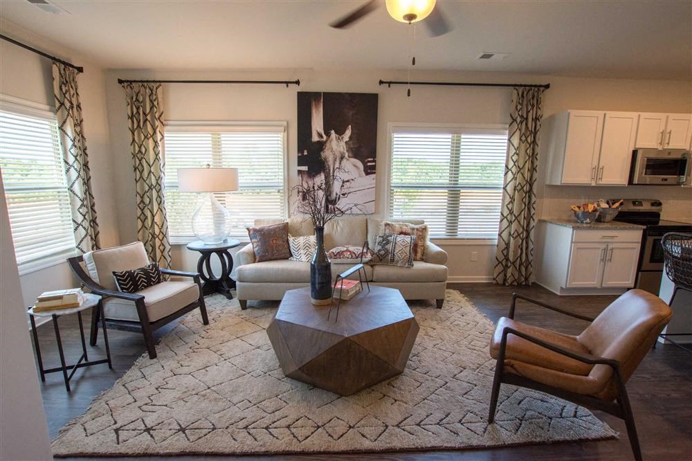 a living room with a couch and a table