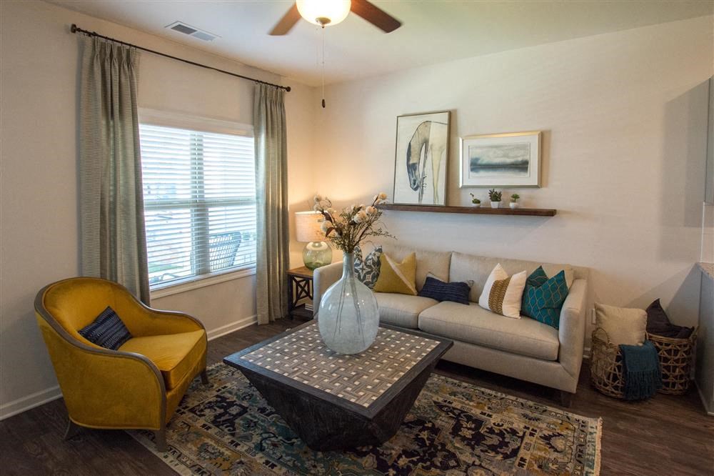 a living room with a couch and a table