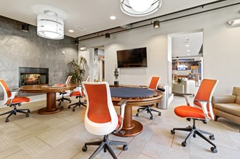 furnished clubroom with gaming tables - Photo Gallery 6