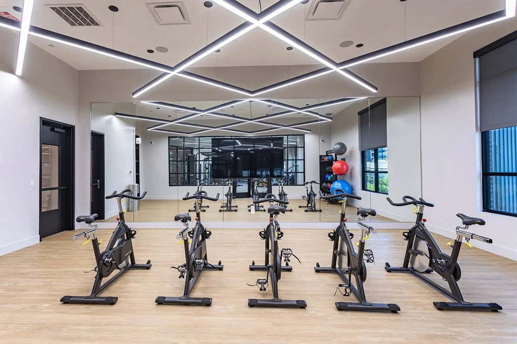 the gym has a large amount of exercise bikesat Sterling Nashville West Apartments, Tennessee