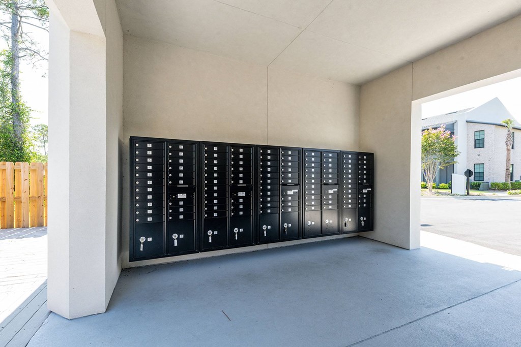the lockers at the front of the building are painted in black and white