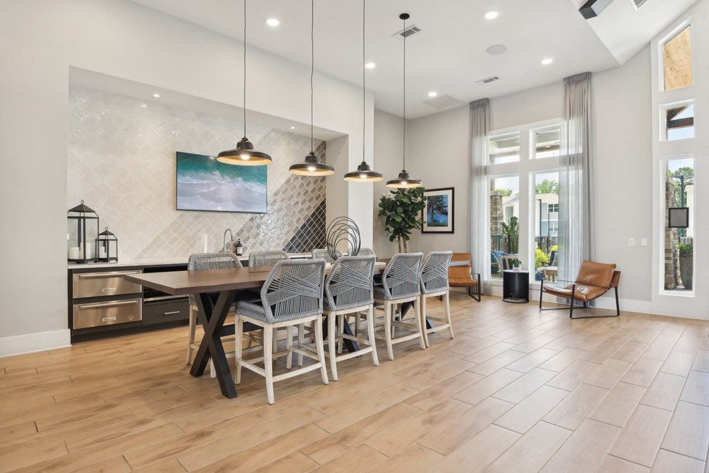 the dining room is open to the living room and kitchen