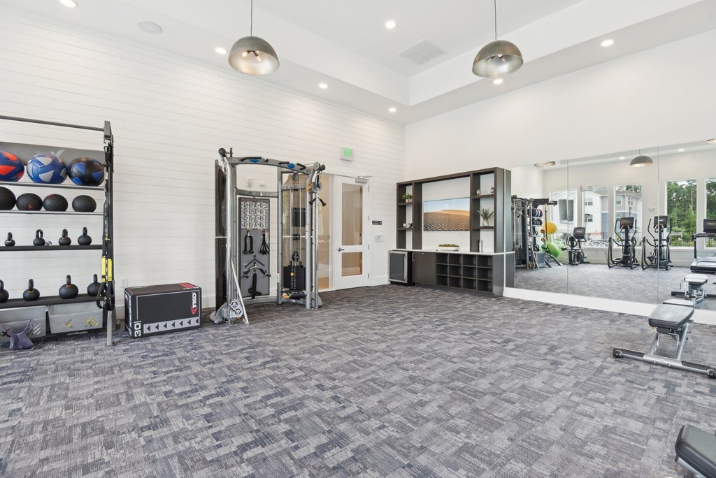 the exercise room at the flats at big tex apartments