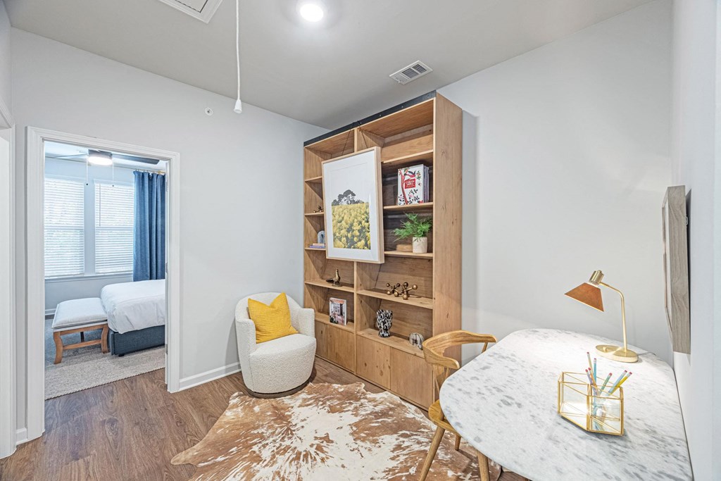 the residence on lamar apartment homes leasing office and living room