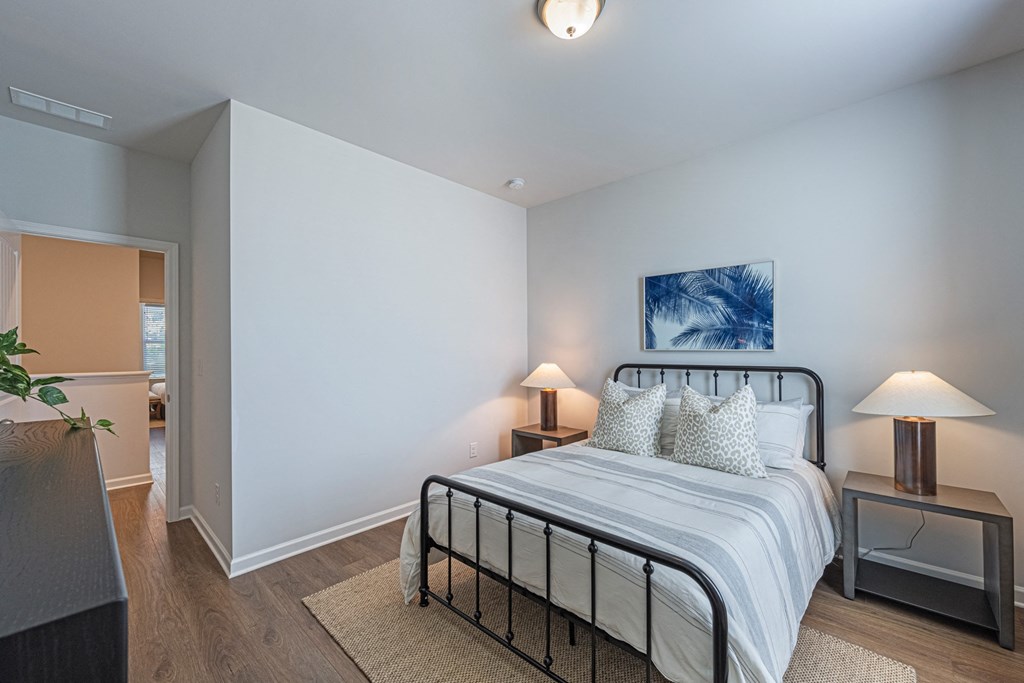 a bedroom with a bed and a closet