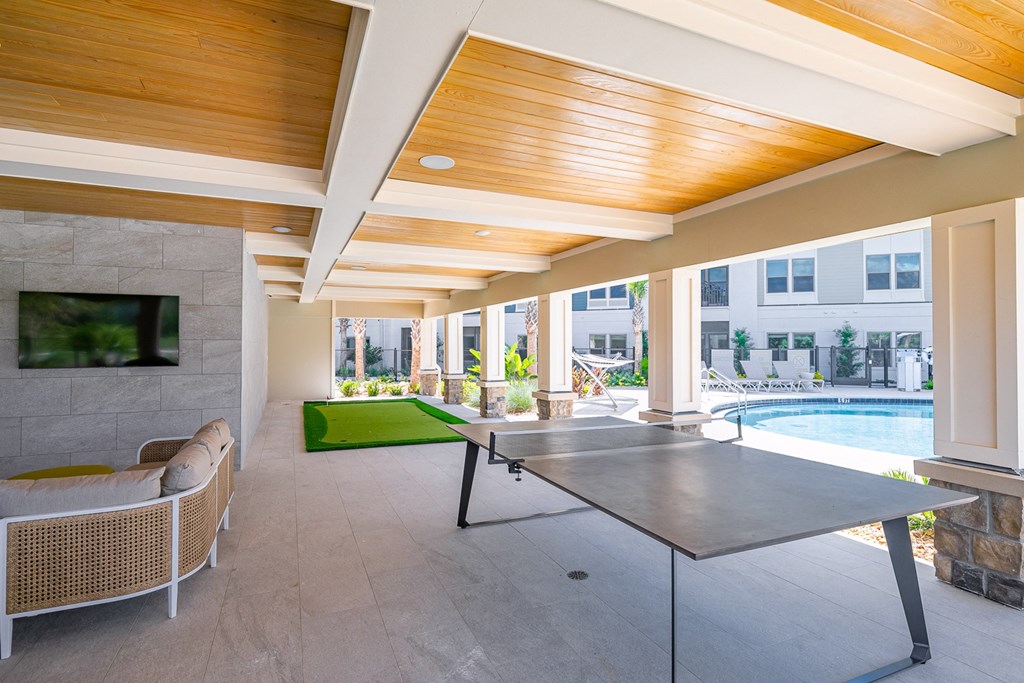the preserve at ballantyne commons clubhouse with pool table and tv
