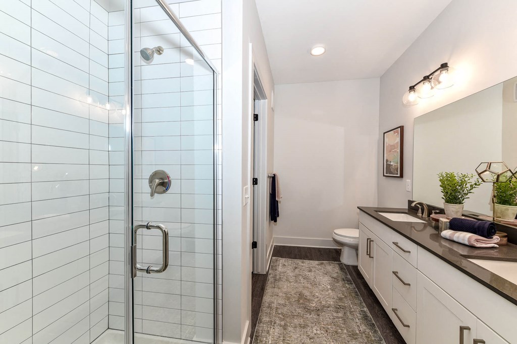 Glass enclosed shower at Elevate West Village, GA, 30080