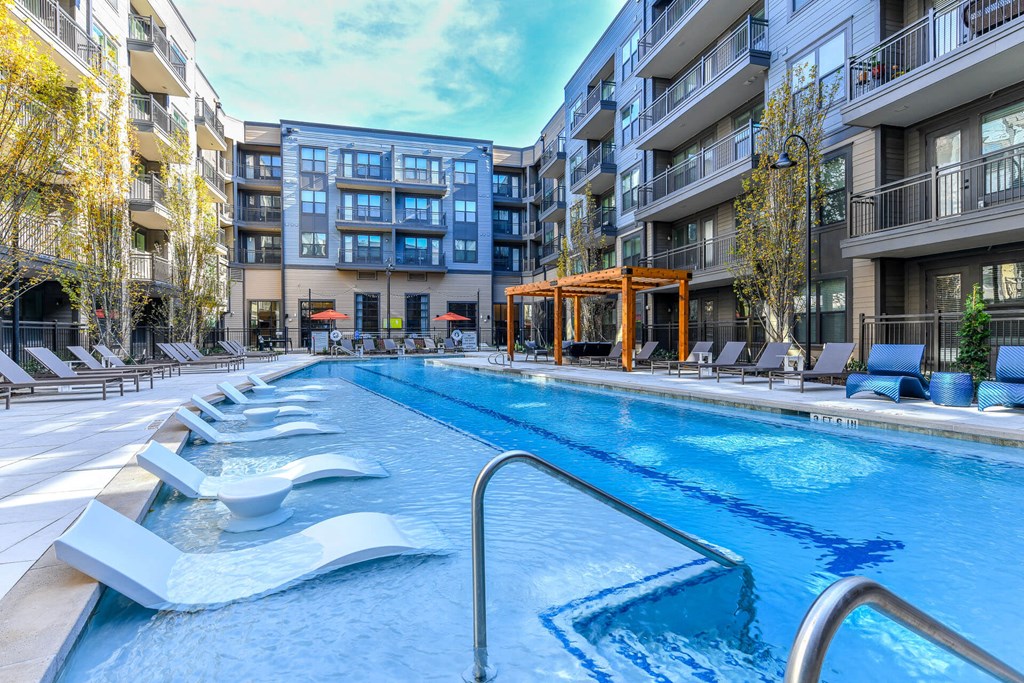 In water lounge chairs at Elevate West Village, Smyrna, GA